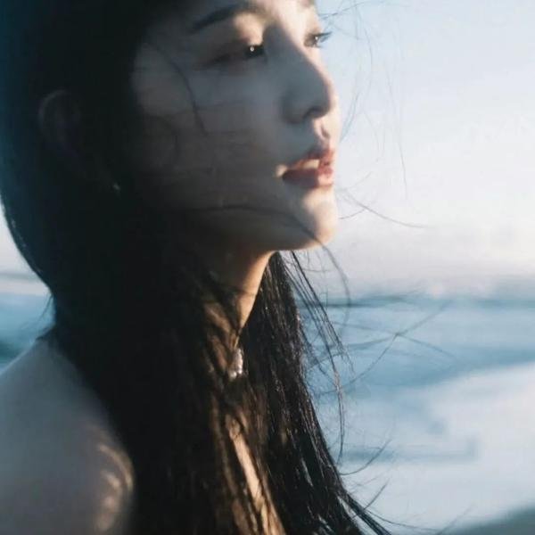 彼女